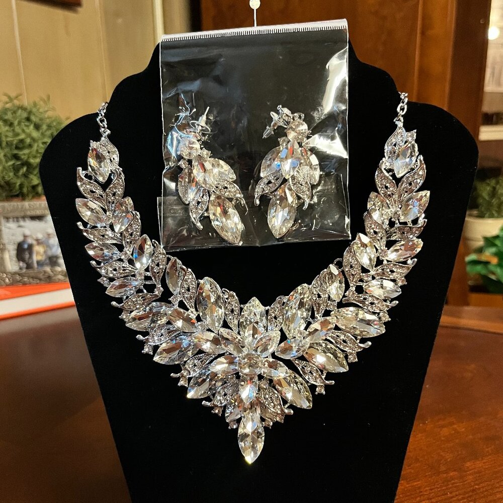 Spectacular crystal silver statement necklace and earrings for special occasion